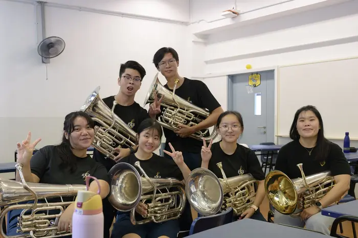 Smiling VENTUS brass players at a band workshop